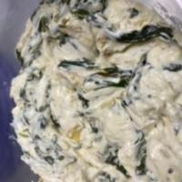 Spinach artichoke  · 8 oz Spinach & artichoke with melted cream cheese & mozzarella served with House Made chips