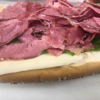 Albert's Corn Beef Hoagie · Corn beef, American cheese with Cajun mayo. Dressed with lettuce, tomatoes, onions, oil and ...