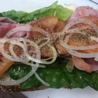 Ham Hoagie · Dressed with lettuce, tomatoes, onions, oil and seasoning.