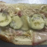 Cubano Sandwich · Ham, pork, Swiss and pickles. Please specify if you would like mayo, mustard or any other co...