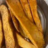 Potato Wedges · Fresh cut potato wedges seasoned with our French Fry Seasoning