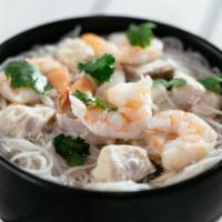 Spring Roll Soup · Shrimp, tender chicken breast and thin rice noodles in pork broth.