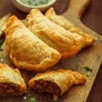 Empanadas · Fried turnover with your choice of meat.