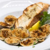 Little Neck Clams Oreganata · Roasted garlic, white wine, olive oil, parmesan bread crumbs