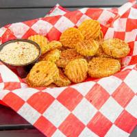 Hand Breaded Fried Pickles · Round slices tossed in a house made batter and fried to golden brown perfection. Served with...