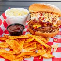 Big BBQ Burger On a Bun · 1/2 lb. patty with smoked and shredded pork topped with  BBQ, slaw and onions. Served with c...