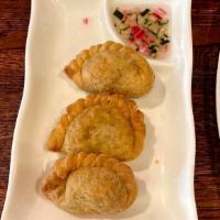 4ps Vegi Curry Puff  · potato, carrots and onions in curry powder flavor, stuffed in puff served with cucumber pick...