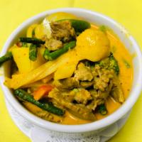 48. Gang Karee (YELLOW CURRY) · Yellow curry and coconut milk with potatoes, long green beans, broccoli, onions and bell pep...