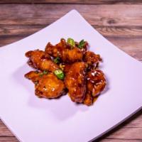 General Tso's Chicken Special · Chunk of chicken lightly deep fried, then sauteed with special red wine sauce. Hot and spicy.