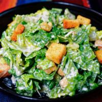 Caesar Salad · Lettuce, Parmesan cheese, and croutons.