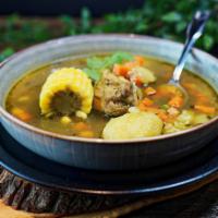 Aguadito de Pollo (Only Weekends) · Chicken soup with peas, carrots, rice, potato and a base of cilantro