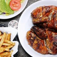 Combo Clasico · Whole chicken, salad and fries