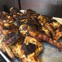 Succulent Jerk Chicken · Seasoned and marinated with house jerk sauce and finished on jerk grill. Served with choice ...