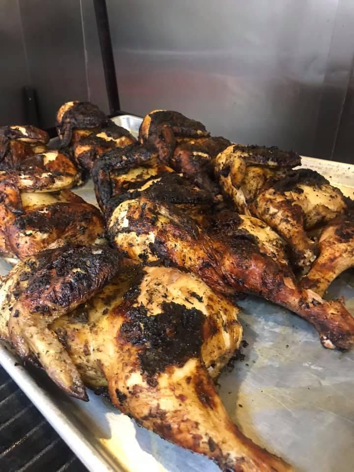 Succulent Jerk Chicken · Seasoned and marinated with house jerk sauce and finished on jerk grill. Served with choice of side.