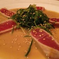 Tuna Tataki · Thin slice of seared tuna w scallion tobiko panzu sauce