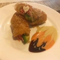 Sushi Pancake · spicy crabmeat,cream cheese,lettuce, Avocado,eel sauce ,sweet washabi sauce,spicy mayo