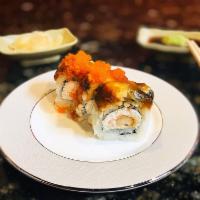 Dragon Roll · Tempura shrimp and crab salad inside
Topped with eel, avocado, masago, and teriyaki sauce

