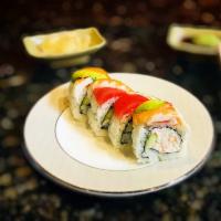 Rainbow Roll · Raw fish. Crab salad and cucumber inside
Topped with salmon, tuna, shrimp, and avocado
