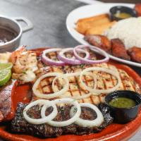 Parrillada Rumbera  · Mixed grill platter! A combination of all our classics from the grill! Churrasco, pork chop,...