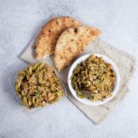 Roasted Brussels Sprouts | 8oz · Quartered Brussels sprouts with tahini, almonds, and golden raisins, served cold (gf, v)