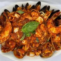 Seafood Fra Diavolo · Serves two. One lobster tail, shrimp, clams, calamari, scungilli, and mussels sauteed in a s...
