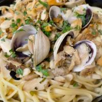 Linguine with Clam Sauce · Linguine with fresh clams, cooked in garlic and spiced with red or white clam sauce.