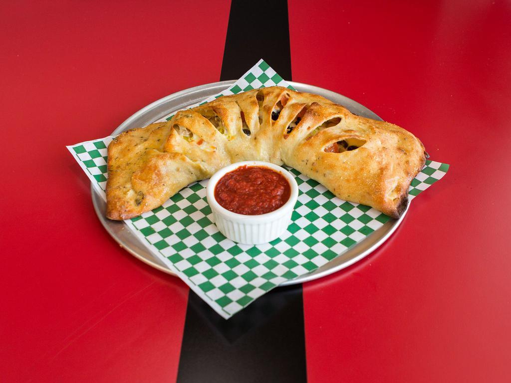 Calzone · Mozzarella and your choice of 3 toppings.