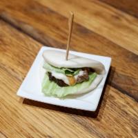 Char Sui Pork Bun · Housemade tender char siu pork, lettuce, mayonnaise & teriyaki sauce wrapped in steamed bun....