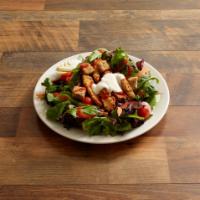 Tossed Chicken Salad · Fresh mixed greens, carrots, onions, croutons, tomatoes, and hard-boiled eggs topped with ou...