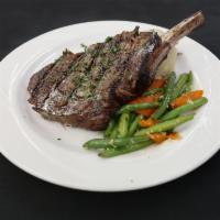 Grilled Bone in Cowboy Ribeye Steak Lunch · 20oz. USDA choice steak. Charbroiled to your liking, finished with demi-glace.
