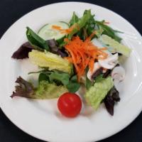 Garden Salad Dinner · Romaine, iceberg, tomatoes, carrots, onions, cucumbers, Kalamata olives.