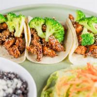 Taquiza 3 General Chicken Taco Plate with Chipotle Beans and Asian Salad · General Chicken Tacos with Broccoli and Sesame Seeds