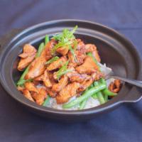 Asian Glazed Chicken · Woks seared chicken with a sweet and savory sauce, steamed green beans and rice.