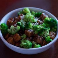 General Tso's TOFU Bowl · Sweet & savory Tofu, broccoli, steamed rice and sesame seeds.