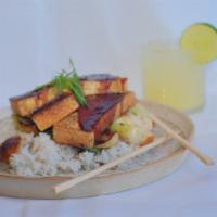 Pan Seared Tofu Bowl · Lemongrass-stuffed tofu seasoned with citrus & soy served with shiitake mushroom, boy choy a...