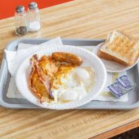 7. Two Eggs, 2 Waffles, 2 Slices of Bacon and 1 Sausage Breakfast Special · 