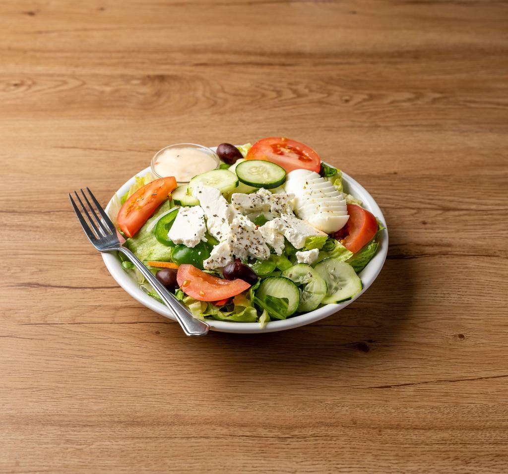 Greek Salad · Feta cheese, anchovies, olives.