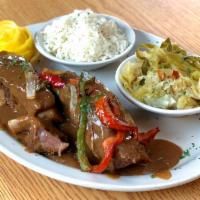 Smothered Short Ribs Of Beef Dinner · USDA Choice Cut Tender Short Ribs of Beef topped Smothered in Brown Gravy and Saut??ed Peppe...