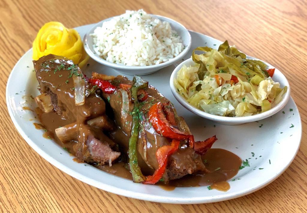Smothered Short Ribs Of Beef Dinner · USDA Choice Cut Tender Short Ribs of Beef topped Smothered in Brown Gravy and Saut??ed Peppers and Onions