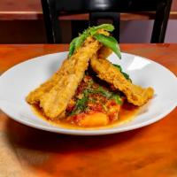 Three Flavor Tilapia · Mild. Crispy filet of tilapia with spicy garlic-basil sauce. Served with steamed veggies and...
