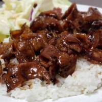 Pork Teriyaki · Our famous grilled teriyaki pork on a bed of steamed white rice and drizzled in homemade ter...