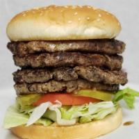 Elephant Burger · Four 1/4 lb. beef patties with lettuce, pickle, tomato and homemade Thousand Island dressing.