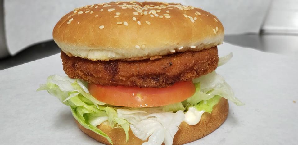 Chicken Sandwich · Deep fried chicken patty, lettuce, tomato and mayo served on a toasted sesame seed bun.