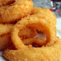 Onion Rings · A generous serving of beer battered onion rings. A tasty upgrade from regular fries, or a li...