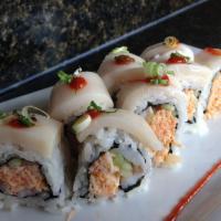White Princess Sushi Roll · Spicy crab, masago and cucumber topped with white tuna, green onion and avocado.