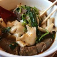Braised Beef with Handmade Noodle Soup · Savory light broth with noodles. 