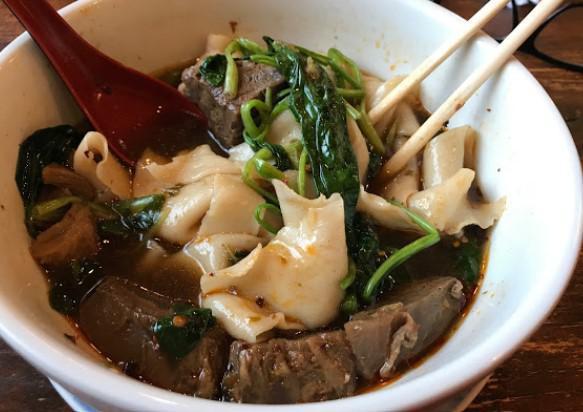 Braised Beef with Handmade Noodle Soup · Savory light broth with noodles. 