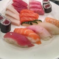 Sushi and Sashimi Combo · Mixed of assorted sushi and sashimi and one tuna roll.
