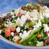 Greek Salad · Romaine lettuce, fresh spinach, cucumber, tomato, green pepper, Kalamata olives, zaatar and ...