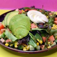 Avocado Salad · Mixed greens, tomato, cucumber, parsley and corn topped with avocado, organic boiled egg wit...